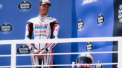 Aksi Veda Ega Pratama di Podium Moto3
