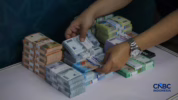 Sejarah tradisi bagi uang Lebaran